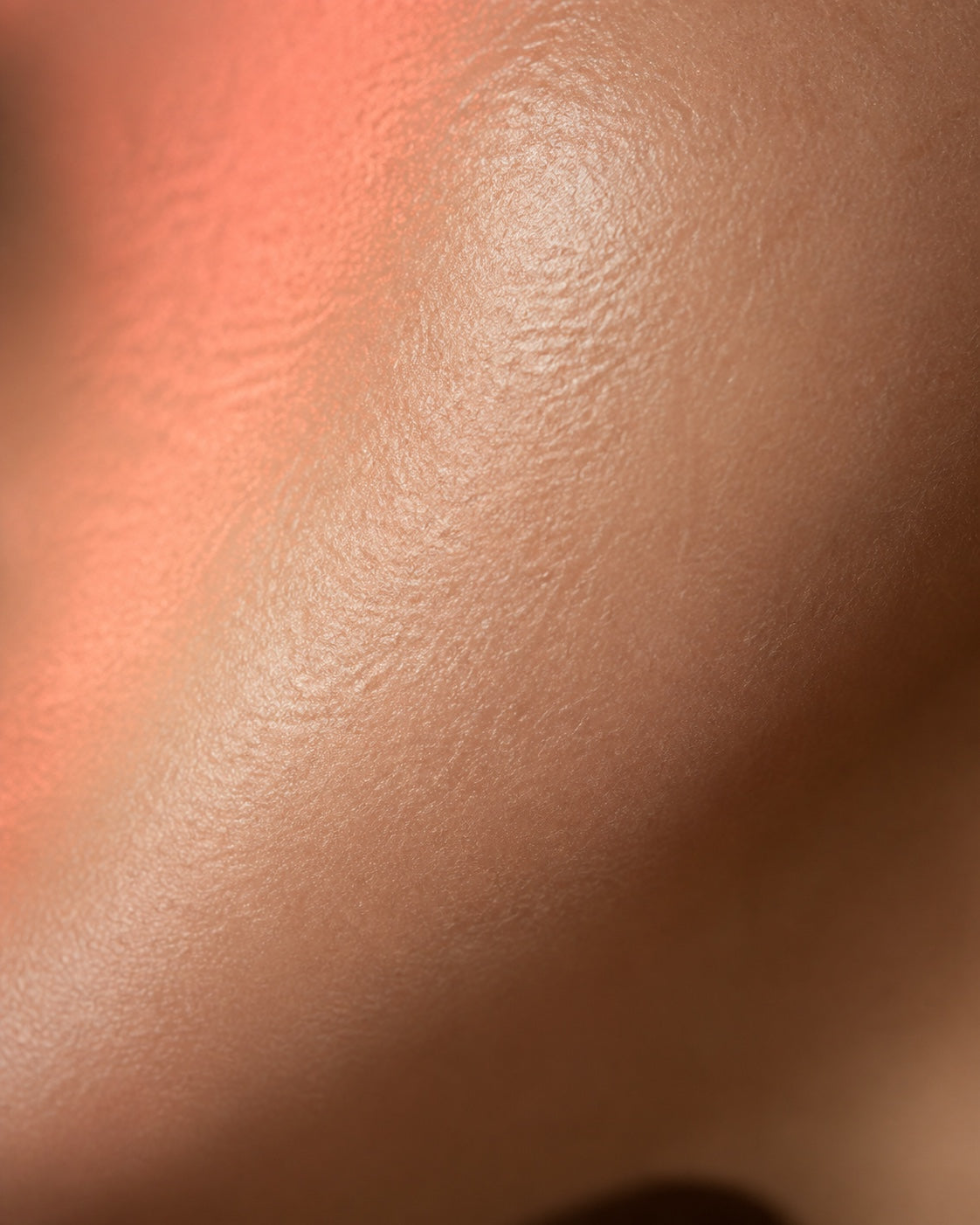Skin routine with subtle red light for a healthier-looking glow